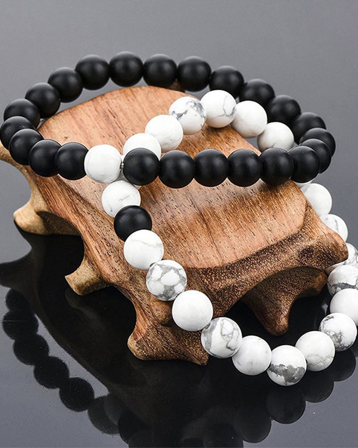 Ensemble de bracelets pour couple tissés en perles noires et blanches